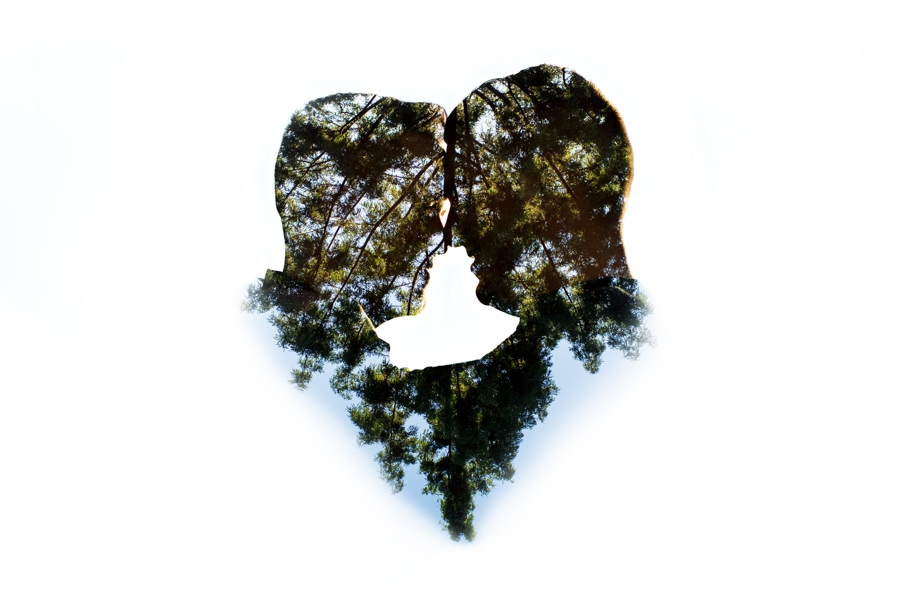 A double exposure of a gay couple about to kiss during their engagement session in Philadelphia.